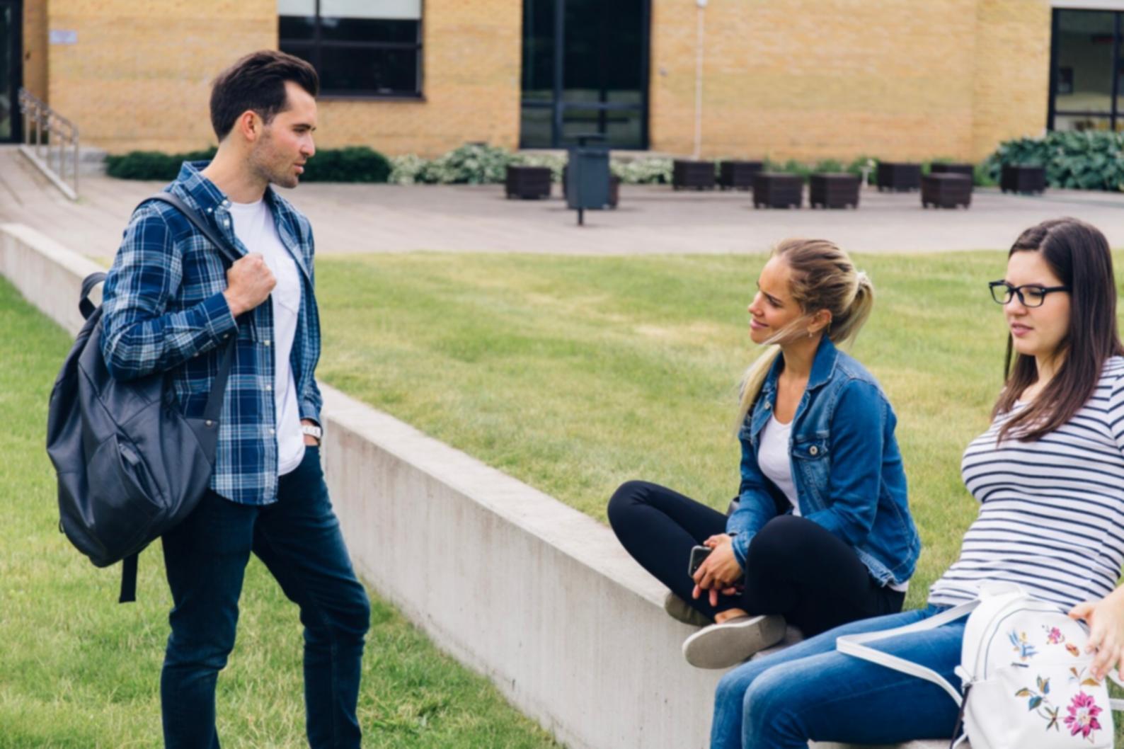 Person working on business finance remotely with laptop and documents